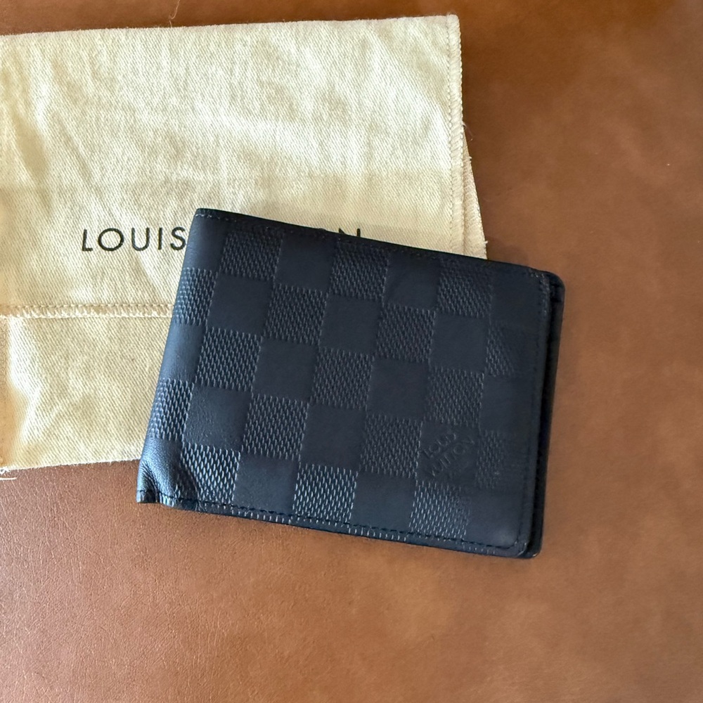 Louis Vuitton Black Checkered Wallet in great shape with dust bag